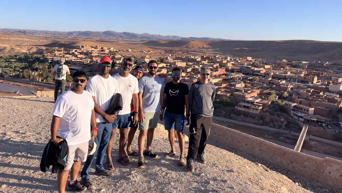 Group above a kasbah town in the Atlas foothills
